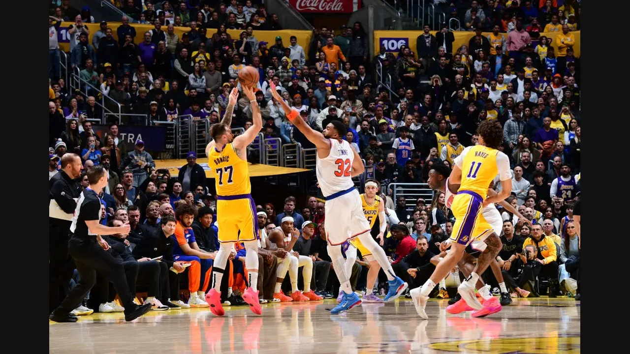 Photograph of Lakers and Knicks players contesting a shot in a packed NBA arena